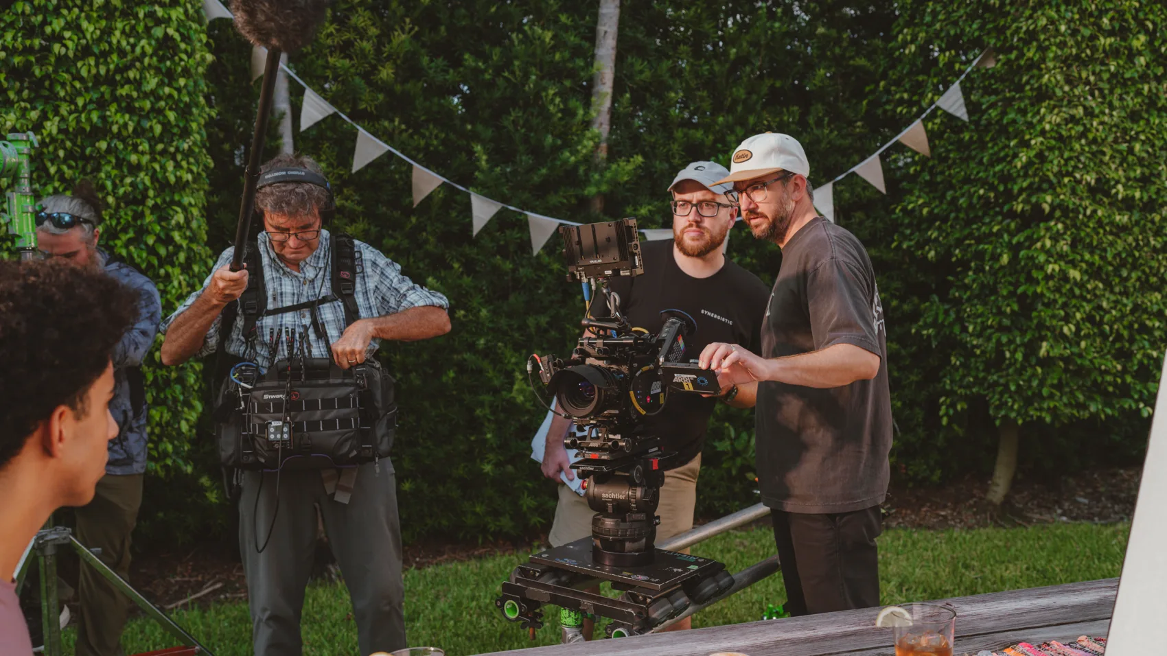 The film crew lining up a shot on location with a camera rig
