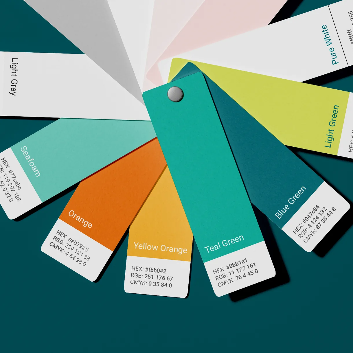 Fan of ōna color swatches in teal, green, orange, and neutrals